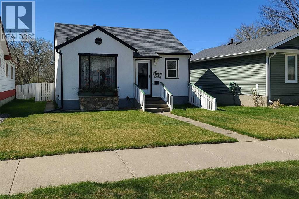 <h3>$299,900</h3><p>1212 7 Avenue S, Lethbridge, Alberta</p>