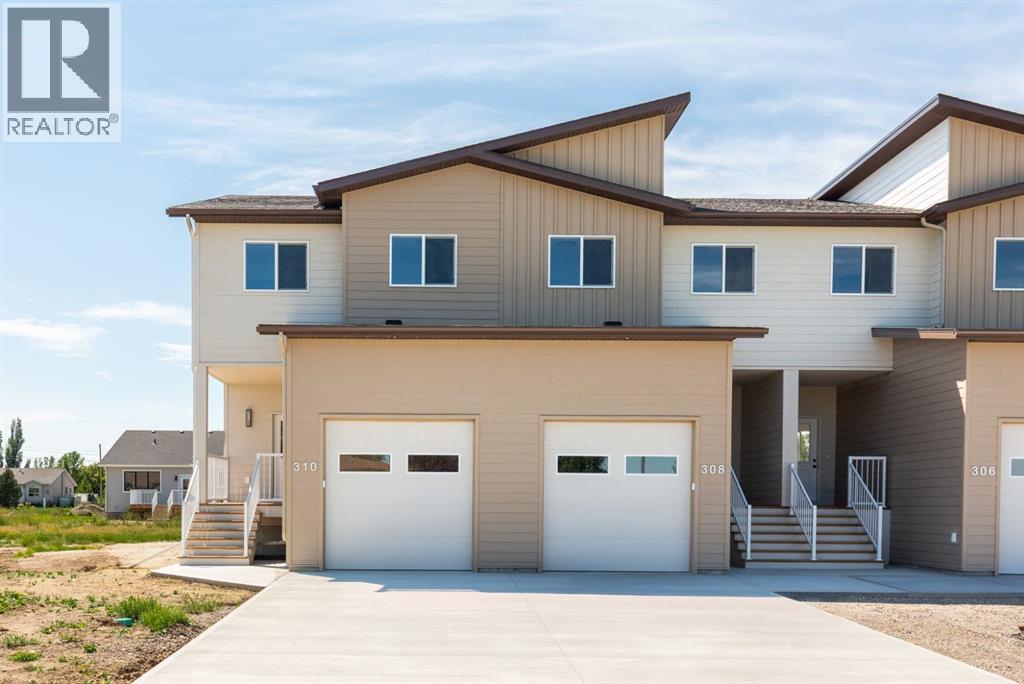 <h3>$384,900</h3><p>310 S 50 W, Raymond, Alberta</p>
