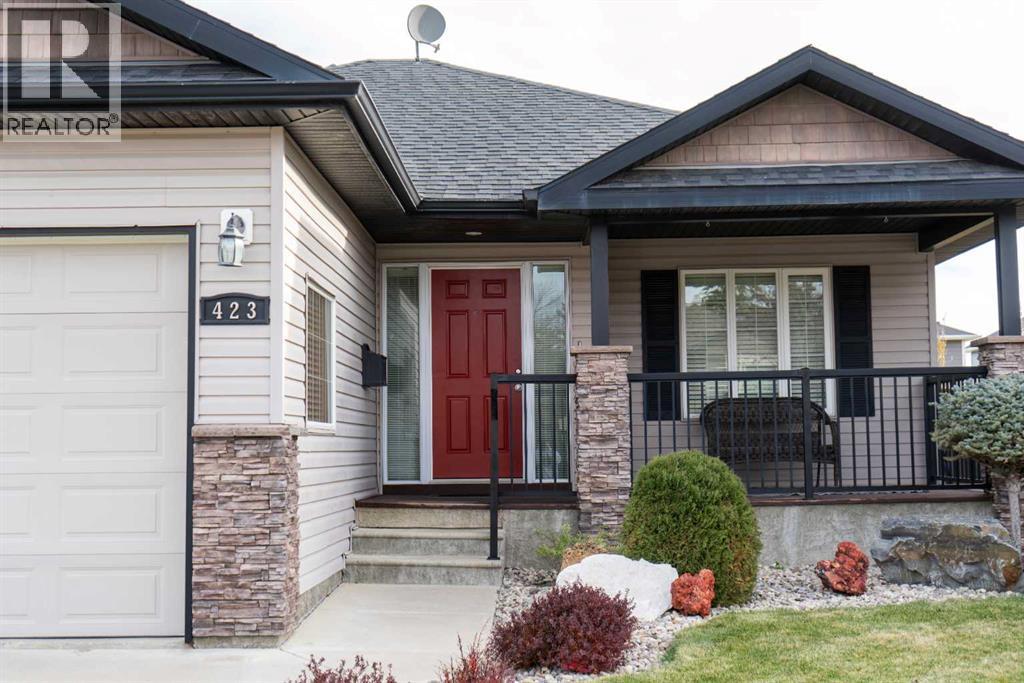 <h3>$399,000</h3><p>423 Centennial Avenue, Nobleford, Alberta</p>